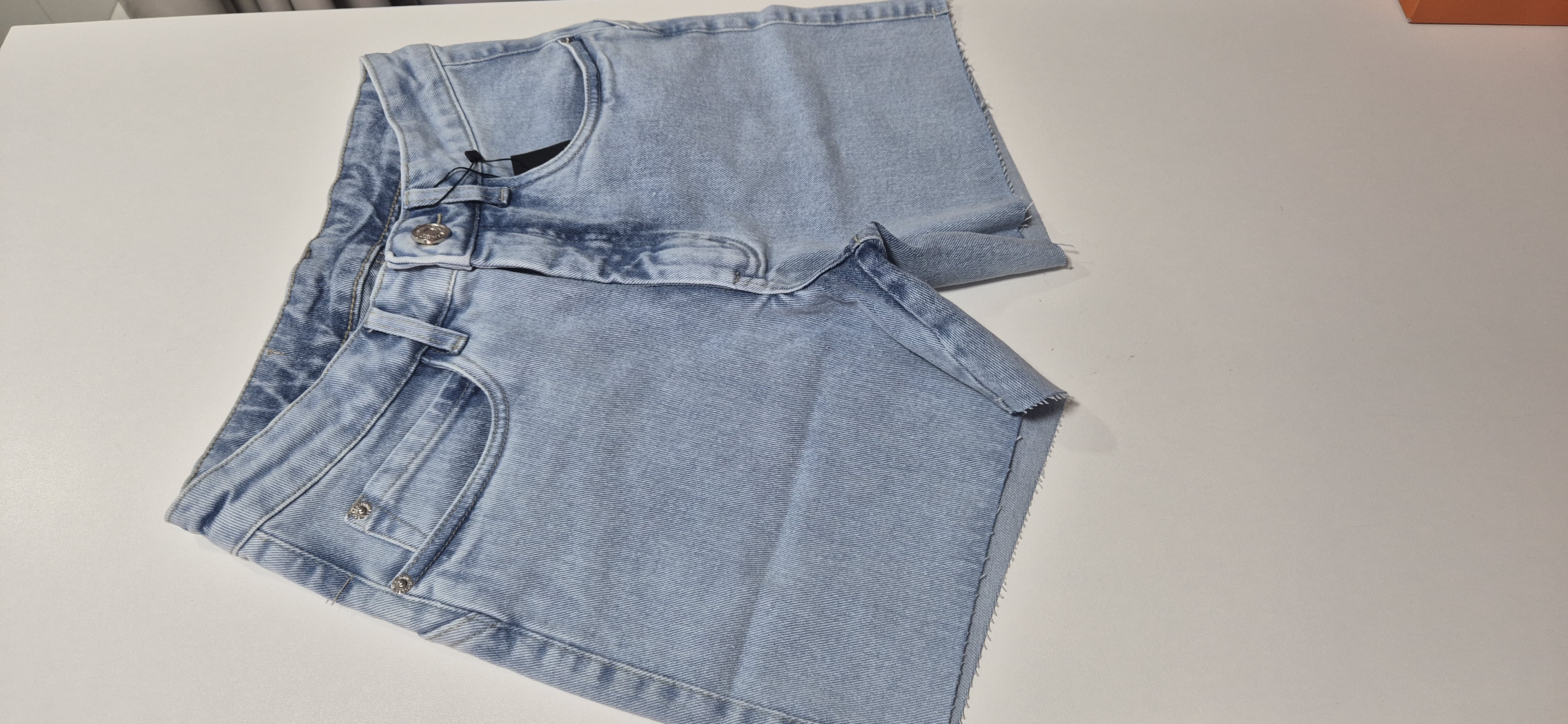 short jeans meia coxa s/lycra
